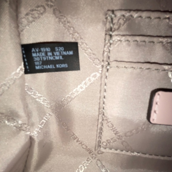 MK Pink multicolor purse.